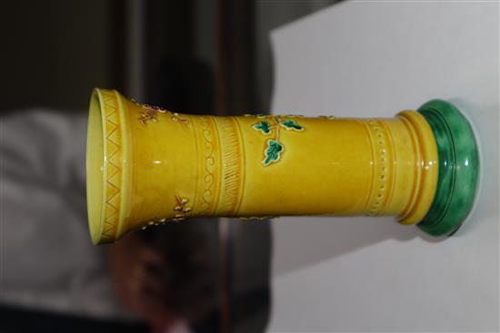 A 19th century Chinese Qing famille jaune carved floral spill vase 15cm high